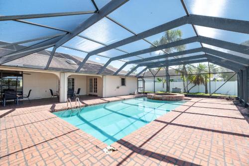 Waterfront 5BR Home with Game room Pool Sleeps 10