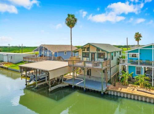Waterfront beach house with the ultimate game room and two docks