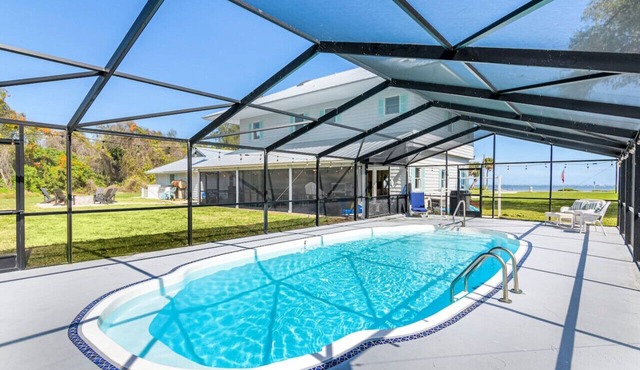 Waterfront Beauty: Sleeps 15, Heated Pool, Private Dock, Near Beach