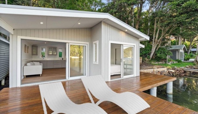 Waterfront Boathouse Stay with Open Deck and Views