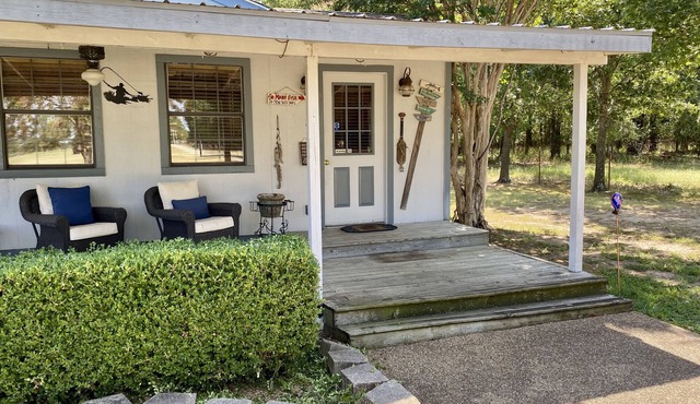Waterfront Cabin on Lake Fork with 2 Boathouses and available boat ramp.