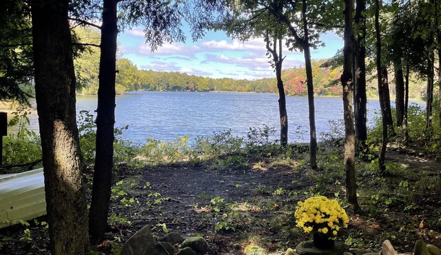 Waterfront camper in Adirondack-like setting