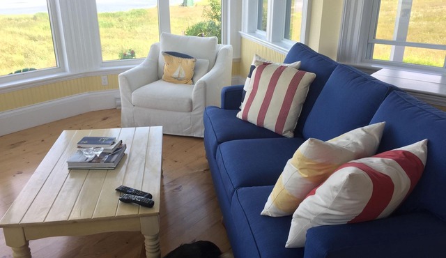 Waterfront cape walk to two long, sandy beaches in pastoral seaside settlement