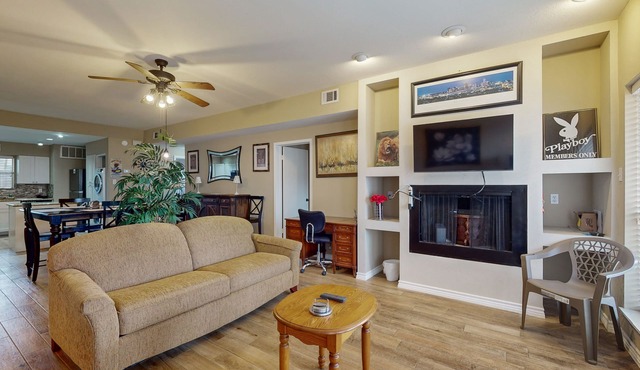 Waterfront community condo with on-site pool, water views, & private patio