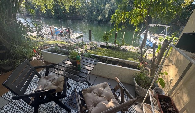 Waterfront Condo with Fishing, Paddleboard, and yard access.