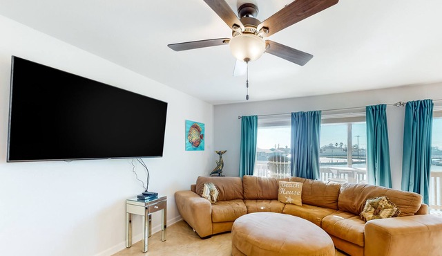 Waterfront condo with balcony, private boat slip, fishing pier, pools, & tennis