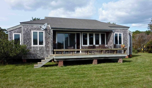 Waterfront cottage a short boat ride to the ocean beach