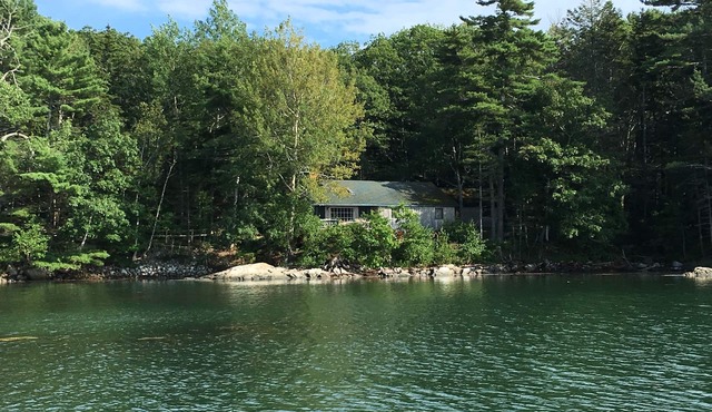 Waterfront Cottage with Sunsets, Hot Tub and Dock access