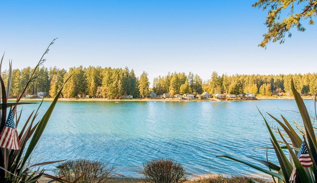 Waterfront, dog-friendly home with private beach, amazing deck & harbor view