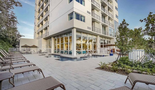 Waterfront Elegance Near Cruiseport | Pool & Gym