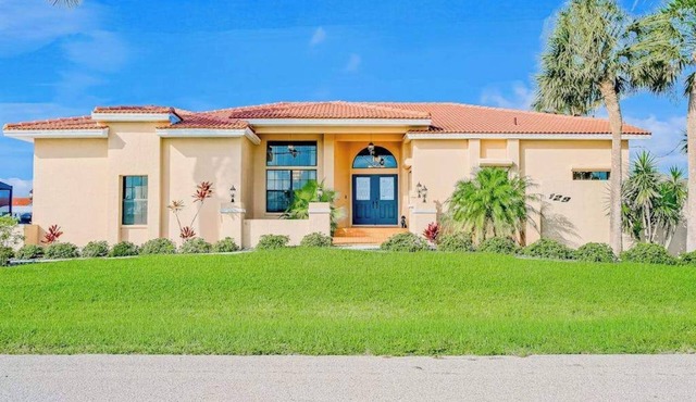 Waterfront Escape with Heated Pool, Stunning Sunsets & Coastal Charm