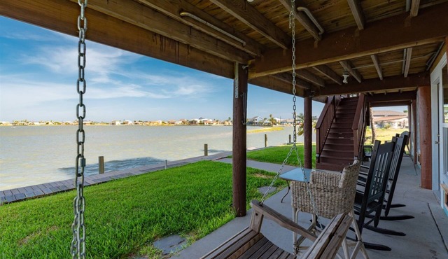 Waterfront Escape by Miss Kitty’s