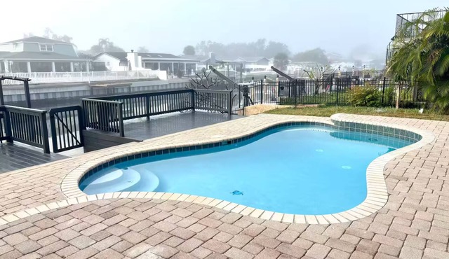 Waterfront Escape: Pool, Space & Style