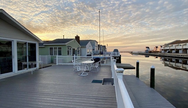 Waterfront Escape with Private Dock, Sunset Views, and Beach Badges!