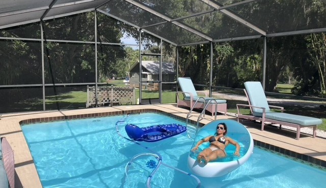 Waterfront Estate over an acre on the water with Large Heated Pool