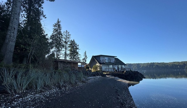 Waterfront family home w/ private beach, cozy woodstove, kayak. Dog-friendly!