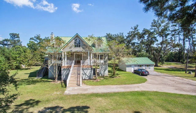 Waterfront Gated Estate on 8 secluded acres!