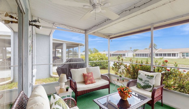 Waterfront getaway with AC, W/D pool, and tennis access