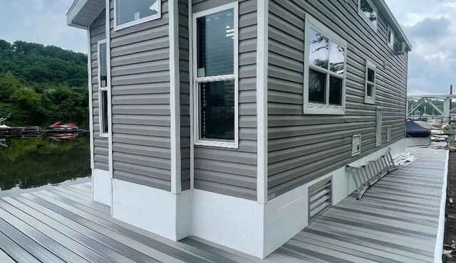 Waterfront Glamping Escape — Cozy Floating Cottages on the Peaceful Beaver River