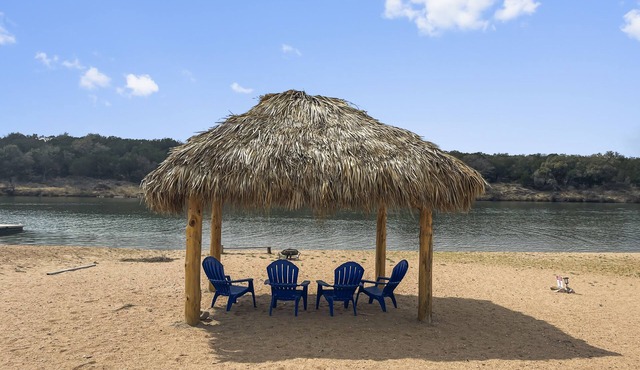 Waterfront, gorgeous sunsets, sandy beach, dogs allowed.