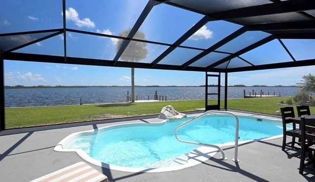 Waterfront Gulf Escape with Dock, POOL, BEACH CHAIRS AND KAYAKS
