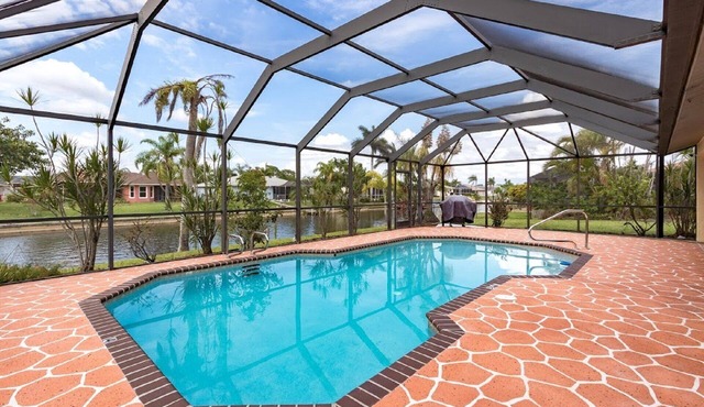 Waterfront Heated Pool Retreat with Dock Pet Friendly Sleeps 6 in Cape Coral