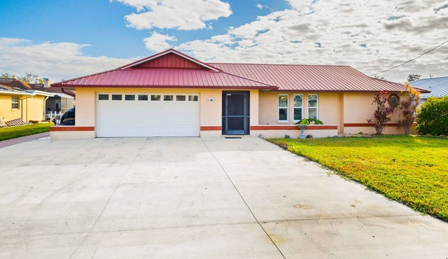 Waterfront home on a canal with saltwater pool, great patio, views & AC