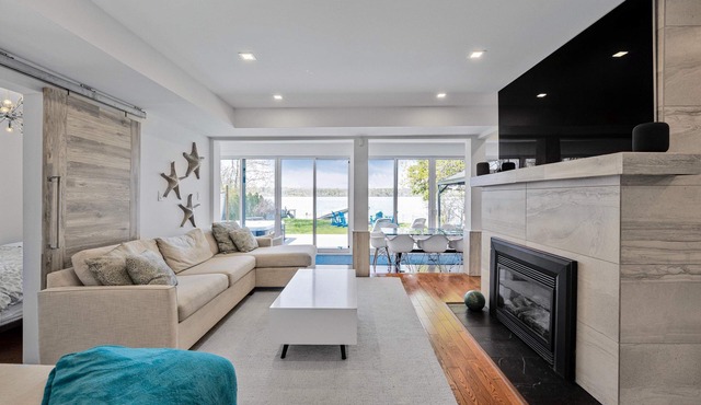 Waterfront home, city/sunset views & steps to beach, Sleeps 12 + new hot tub