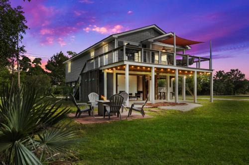 Waterfront Home Game Room Ping Pong Outdoor Bar Area