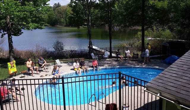 Waterfront home in Lake Ann w/outdoor pool. Row boat, kayak, canoe. Dog ok,