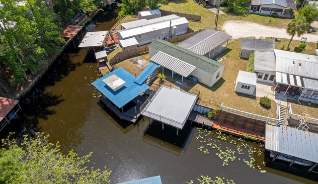 Waterfront home in Satsuma. Two bedrooms each with full bath. Gas grill.