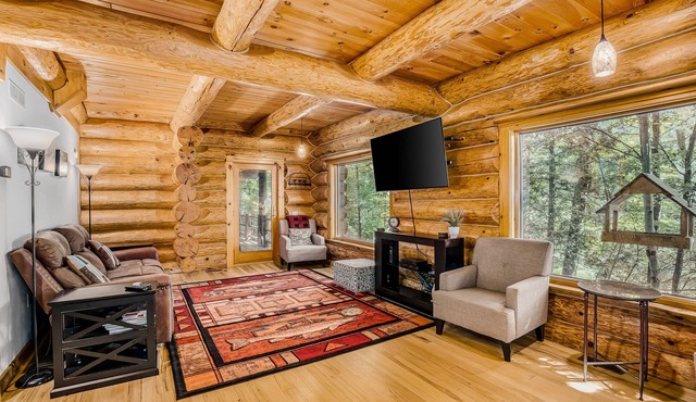 Waterfront home on Betsie River with hot tub & sauna near skiing at Crystal Mtn