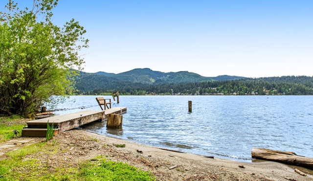 Waterfront home on Lake Whatcom with private dock, beach, firepit & woodstove
