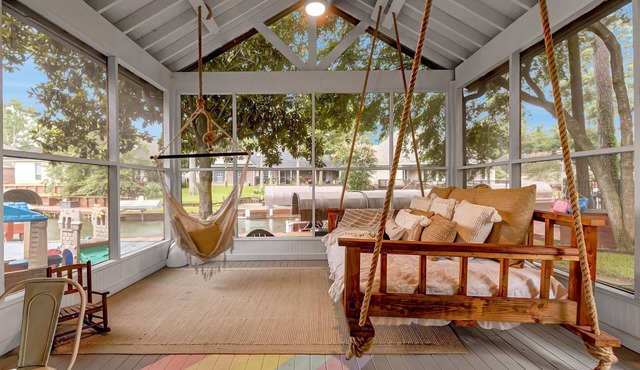 Waterfront Home on Lake Conroe with a private dock and covered boat lift.