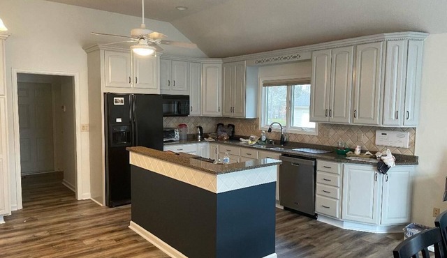 Waterfront home on Pigeon Roost Creek at lake center. Easy access to main lake.