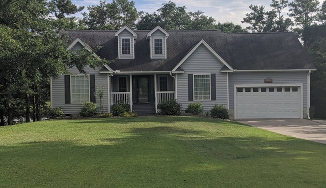 Waterfront Home on tidal creek with Fishing Dock, 5 miles to Ocean Isle Beach