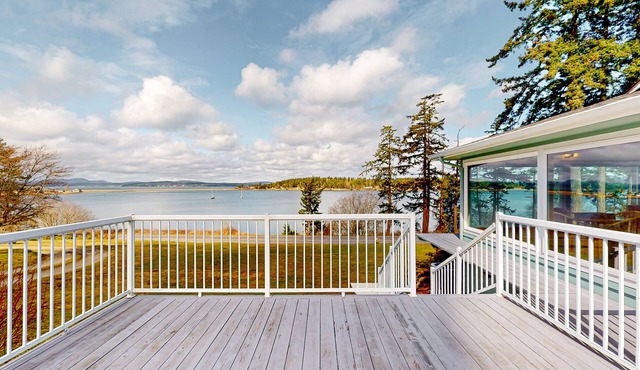 Waterfront home on Fisherman Bay with amazing deck, sunset view, & Ping-Pong