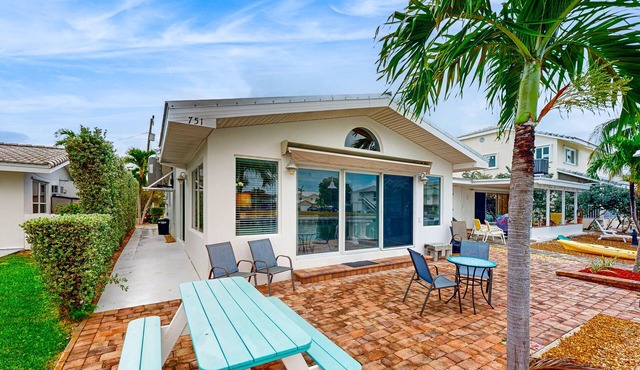 Waterfront Home with 35-Foot Dock and Access to Private Beach and Shared Pool