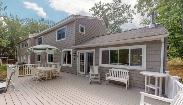 Waterfront home with deck, patio, grill, firepit, Ping-Pong, & WiFi