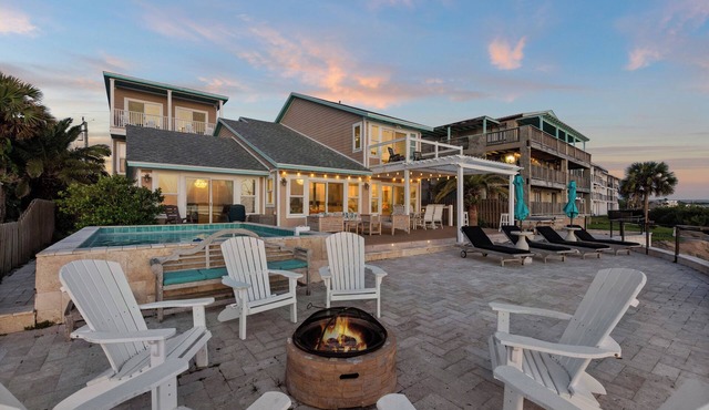 Waterfront home with dock, heated pool, & spectacular views- walk/bike downtown!