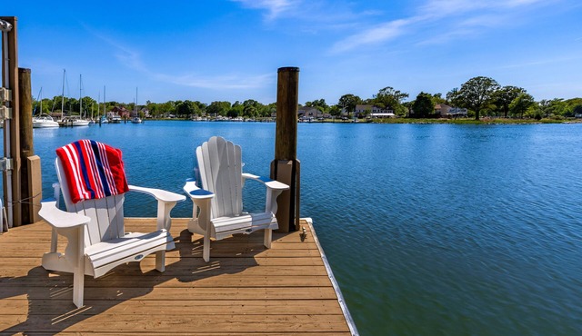 Waterfront home with spacious deck, dock, washer/dryer & central AC