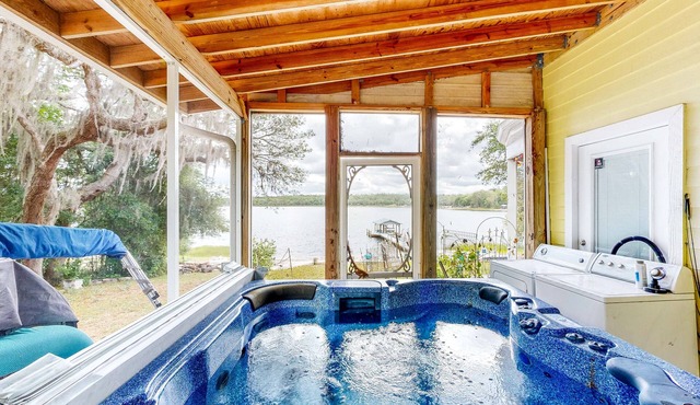 Waterfront home with private hot tub, arcade room & firepit - dog-friendly