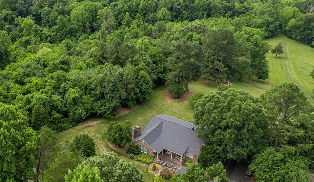 Waterfront home with 5 Acres! 4 bedrooms 3.5 bathrooms