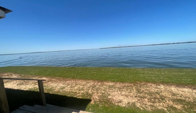 Waterfront home with AWESOME sunsets! Amazing boat/jet ski house. Fish & Swim