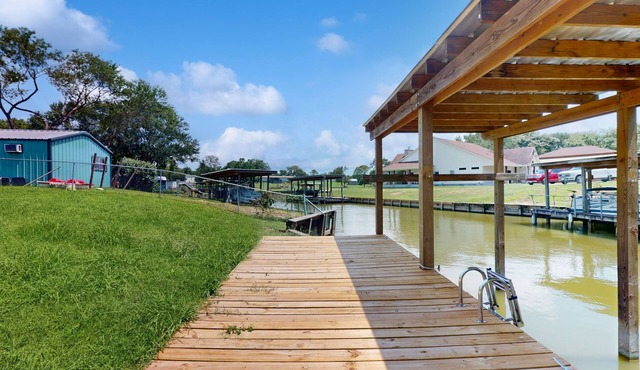 Waterfront home with private deck, washer & dryer, and internet