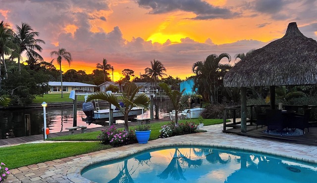 Waterfront home with Private Pool & Dock in Palm City. Pet friendly.