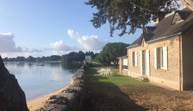 Waterfront house with large walled garden