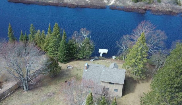 Waterfront house w/large garage located on trail 8 in Grand Marais.