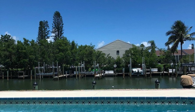 Waterfront Island Home with Dock, Pool and just steps to the Beach!