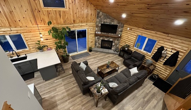 Waterfront Log Home with Beach and Hot Tub. Pet Friendly!